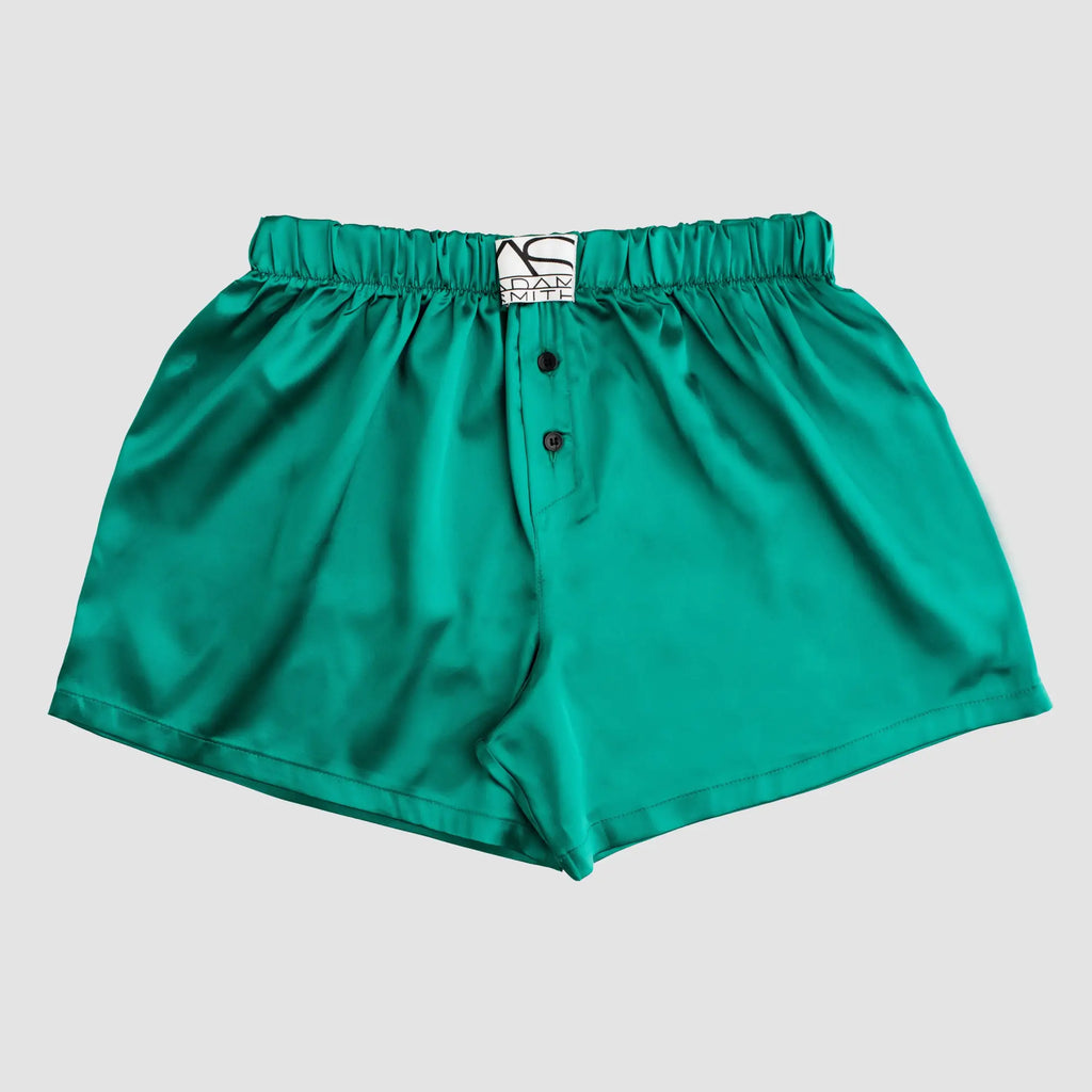 Emerald green satin sweetheart boxer shorts with black button closure and adam smith brand label