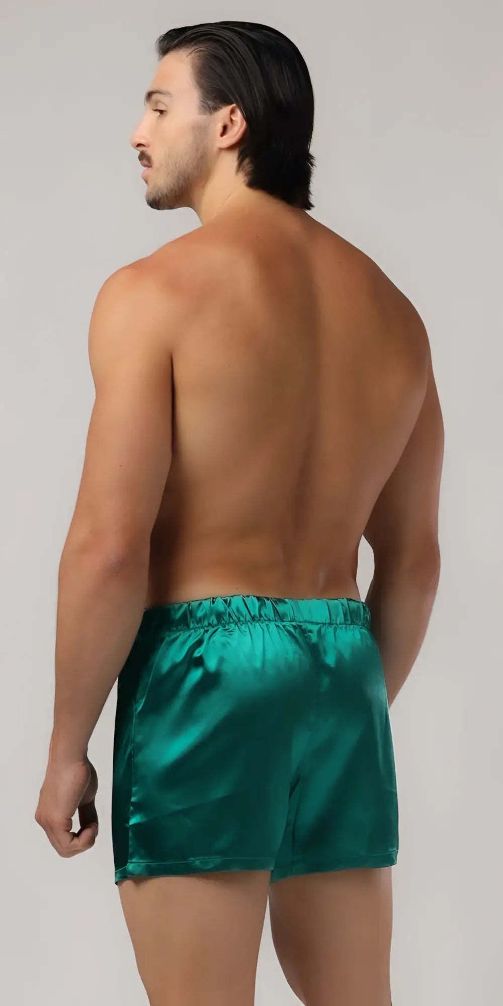 Emerald green sweetheart boxer satin shorts with a smooth shiny finish and elastic waistband for comfortable wear