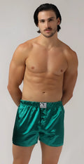 Shiny emerald green satin sweetheart boxer shorts with a white label at the waistband for stylish comfort