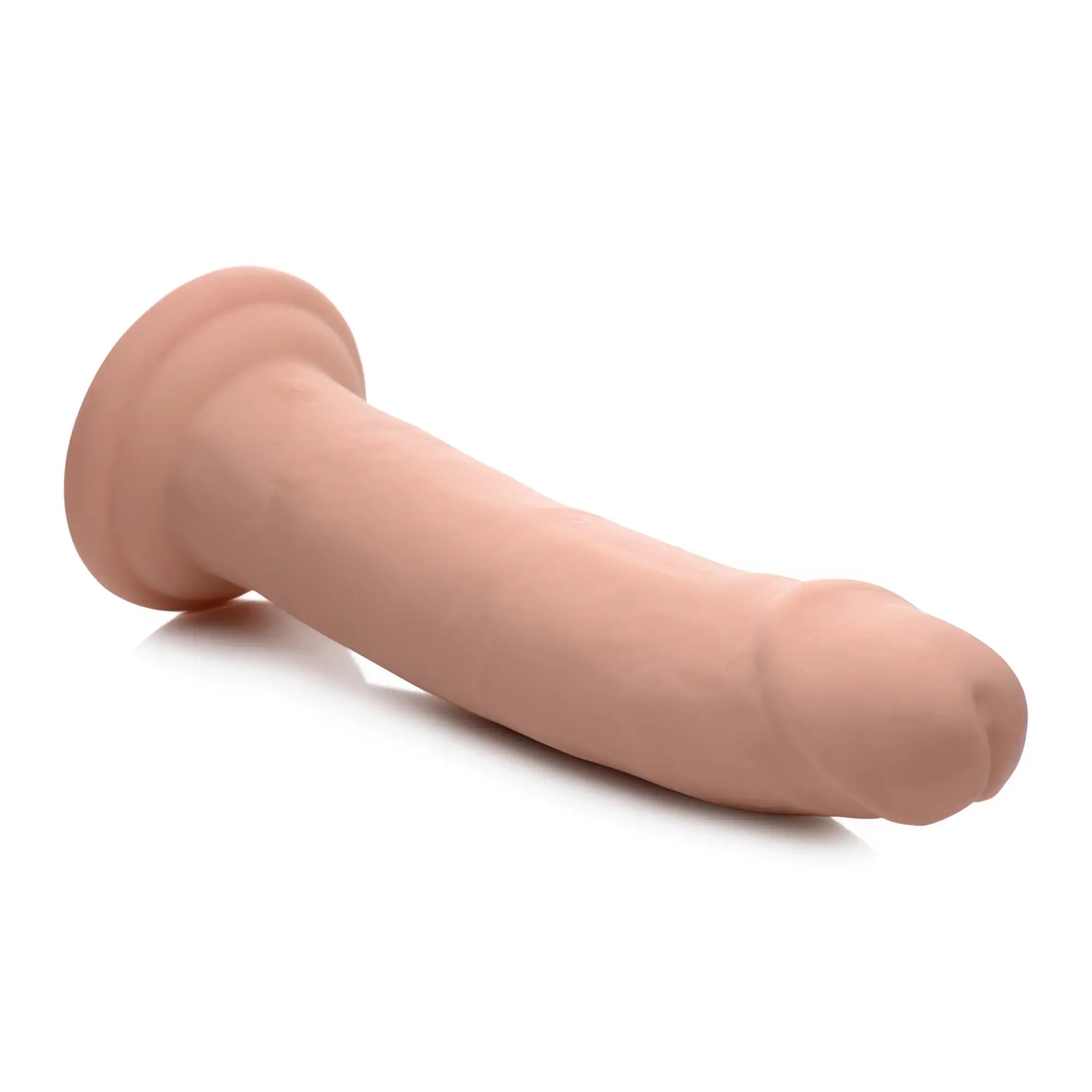 Swell 7X inflatable silicone dildo in a realistic, flesh-toned skin color with a wide circular base.
