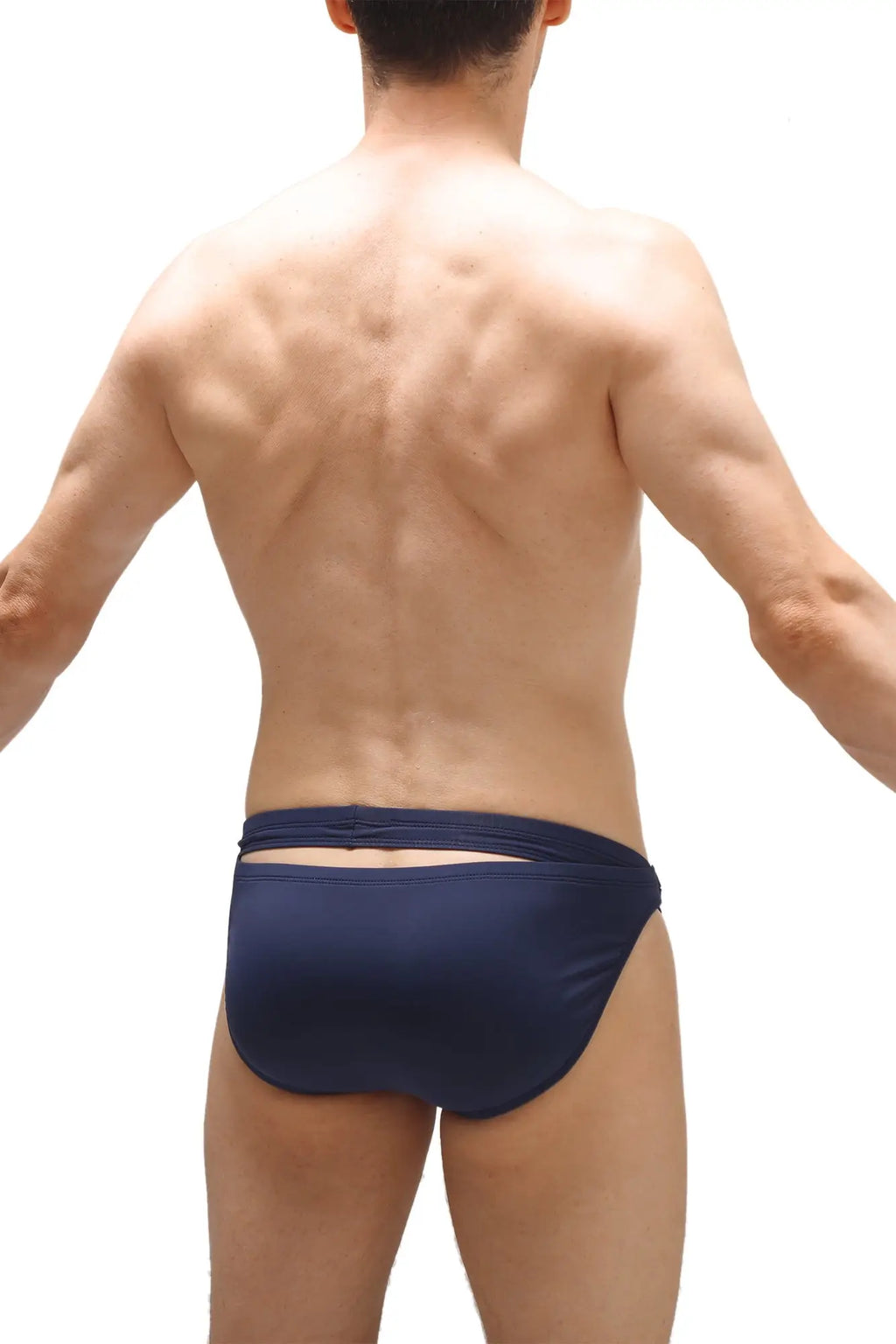 Back side of navy blue recycled swim bikini griede swim trunks with cutout detail for sustainable beachwear