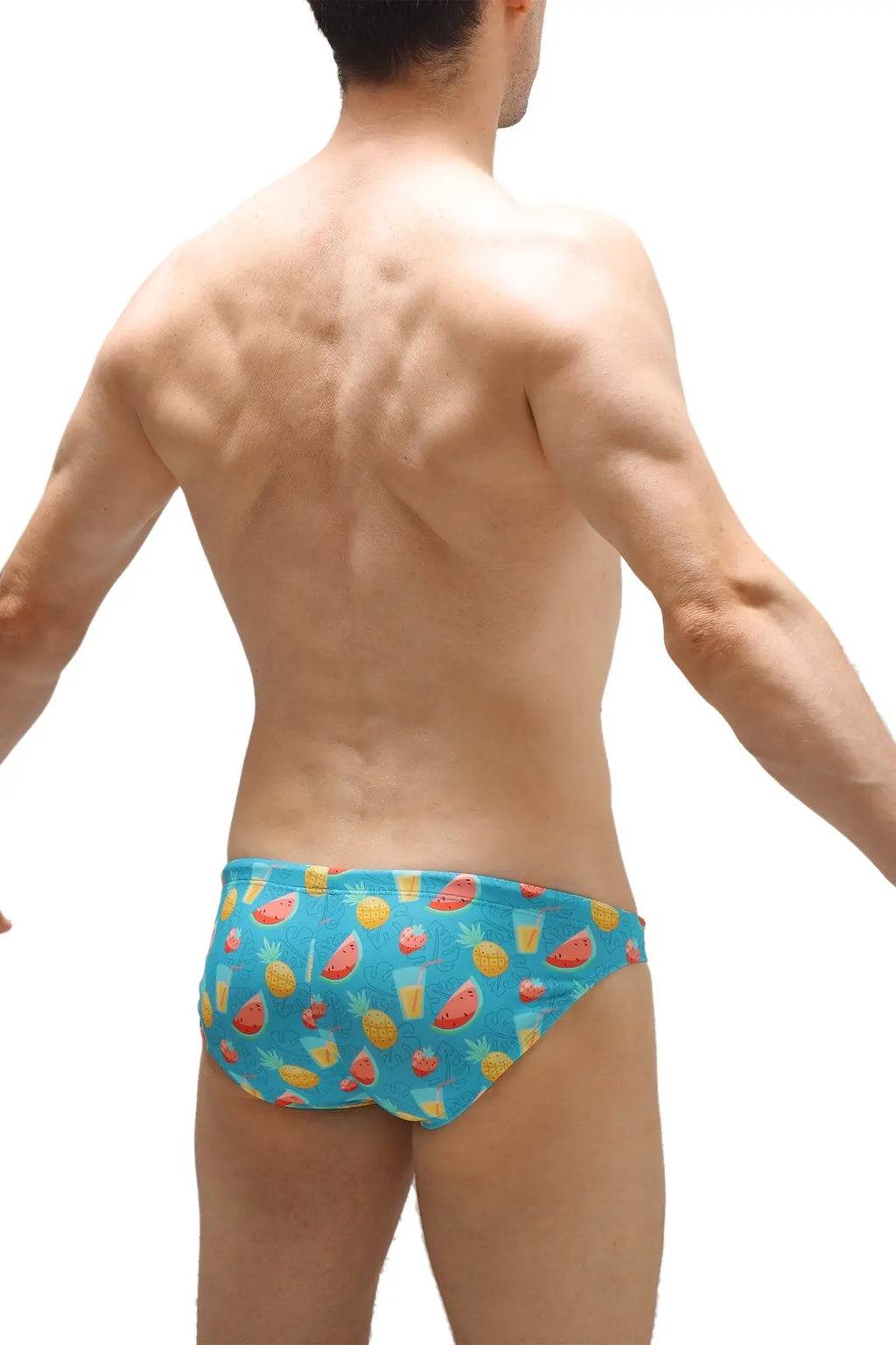 Blue swim trunks with a playful watermelon pineapple and tropical drink pattern in swim bikini taik punta design