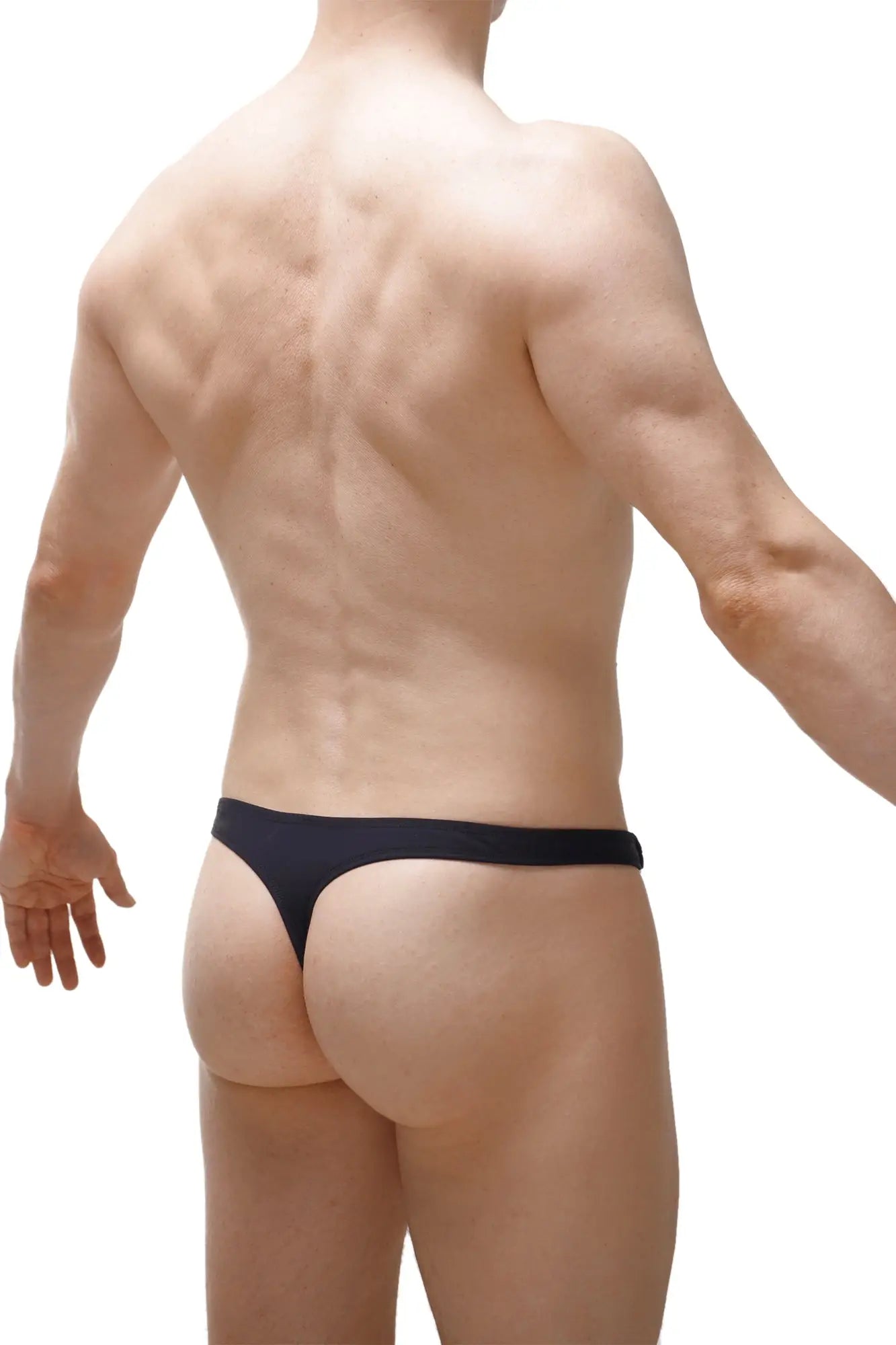 Black swim thong made from recycled material shown from the back for sustainable beachwear use