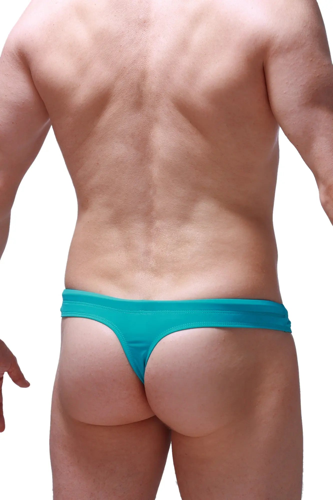 Teal-colored swim thong made of stretchy fabric with a snug fit and minimalistic design shown from the back side