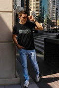 Black short-sleeved cotton t-shirt with emotional support top printed in white and gray on the chest