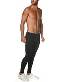 Black tactical gym-tech stretch slim jogger with sleek form-fitting design and subtle side zipper pockets