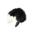 Tailz large anal plug with a fluffy, black-and-white faux fur fox tail attached to a smooth black base.