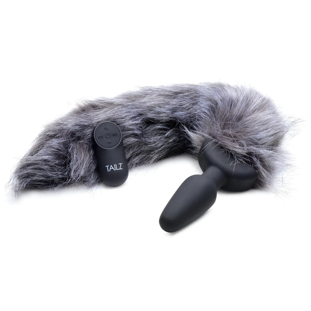 Tailz remote control vibrating anal plug with a fluffy grey faux-fur fox tail and a black handheld controller.
