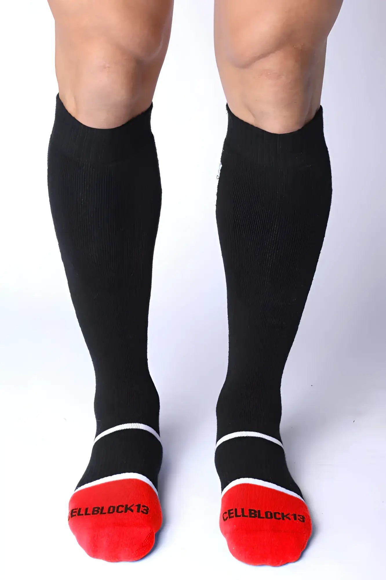 Black take down knee high compression socks with red toe caps white trim and cellblock13 logo on each foot