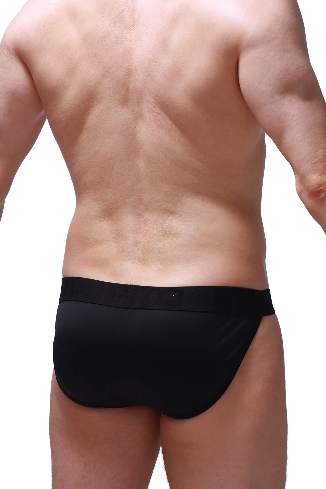 Black tanga pinces briefs with smooth form fitting fabric and wide elastic waistband shown from the back side