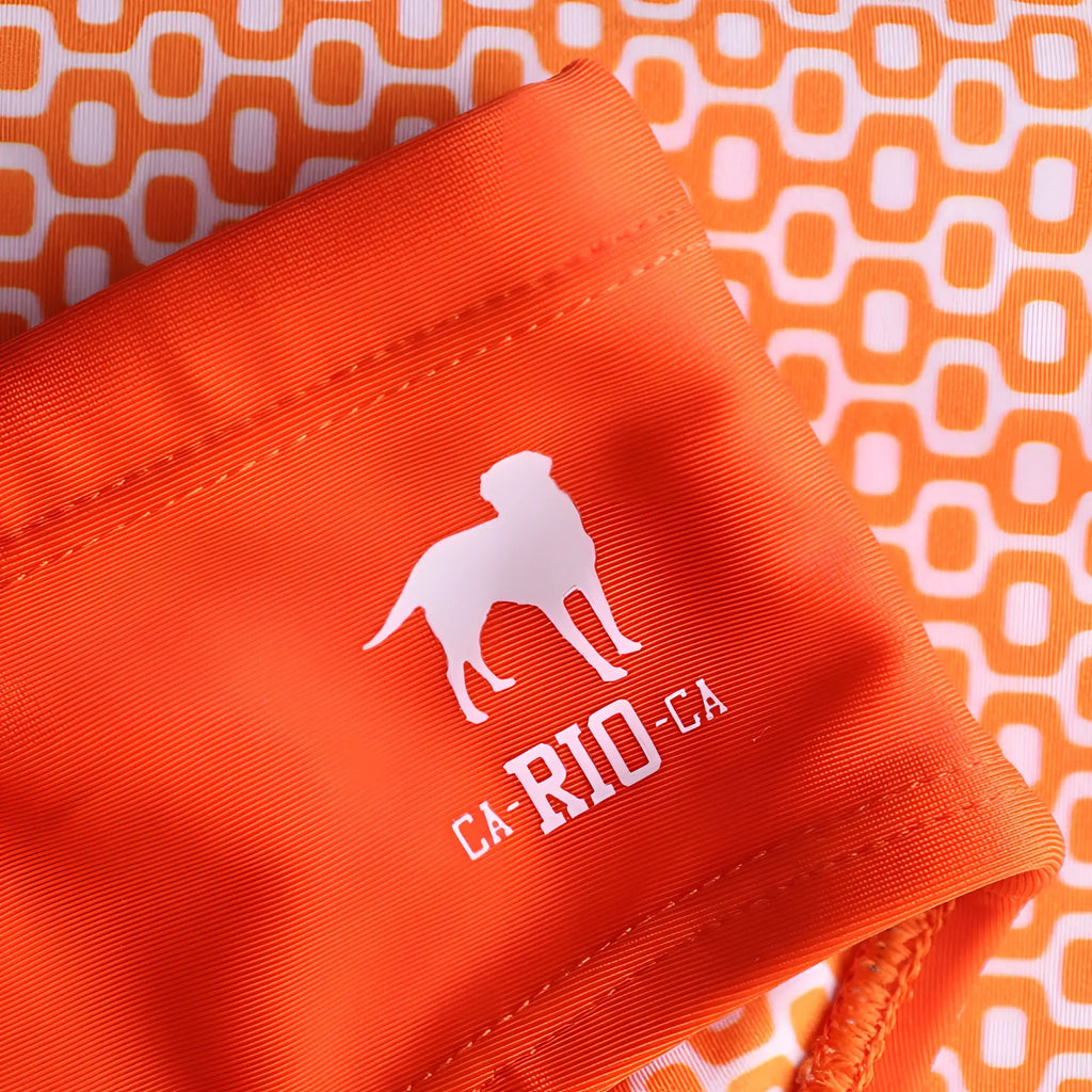 Bright orange tangerine solids men’s swimming sunga with white dog silhouette and ca-rio-ca print for beachwear