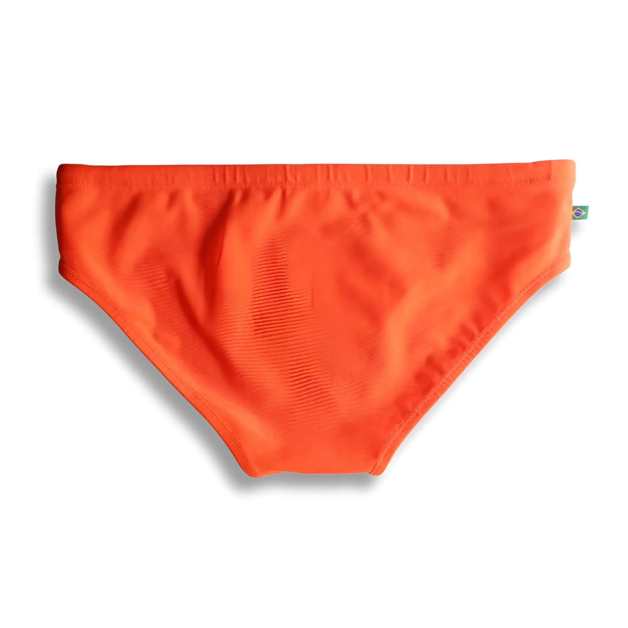Bright orange tangerine solids men’s swimming sunga with smooth stretchy fabric and small brazilian flag tag for beachwear