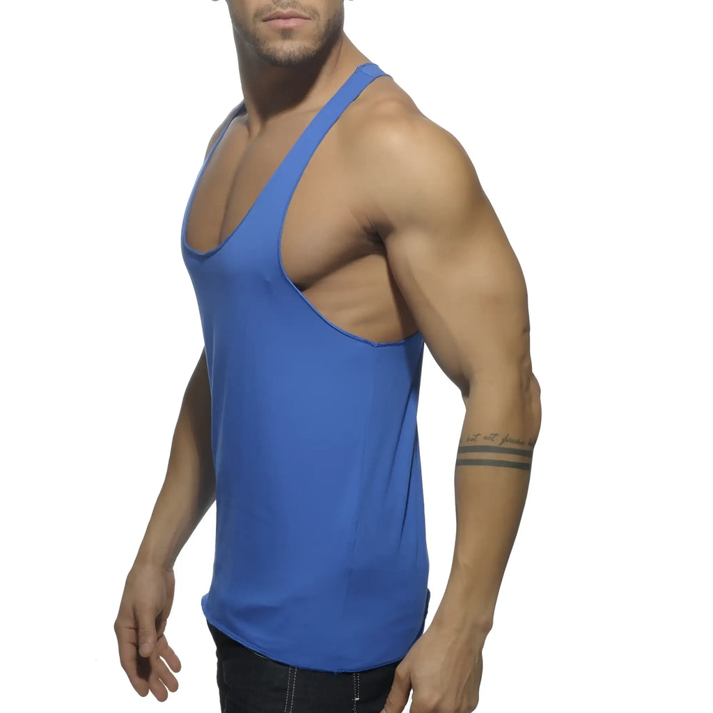 A vibrant royal blue form-fitting muscle tank top with deep scoop neckline and racerback design shown from back