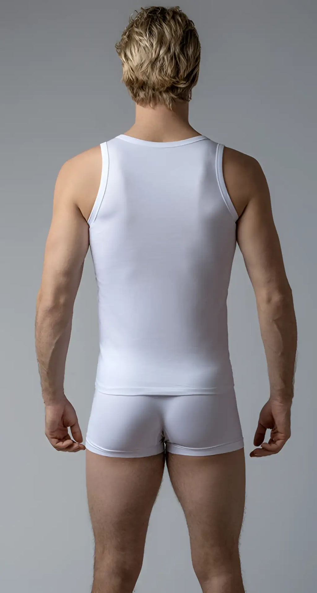 White cotton tank top with a simple fitted design perfect for casual wear