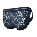 Navy blue tartarus lace brief with white floral pattern and gray trim along waistband and leg openings