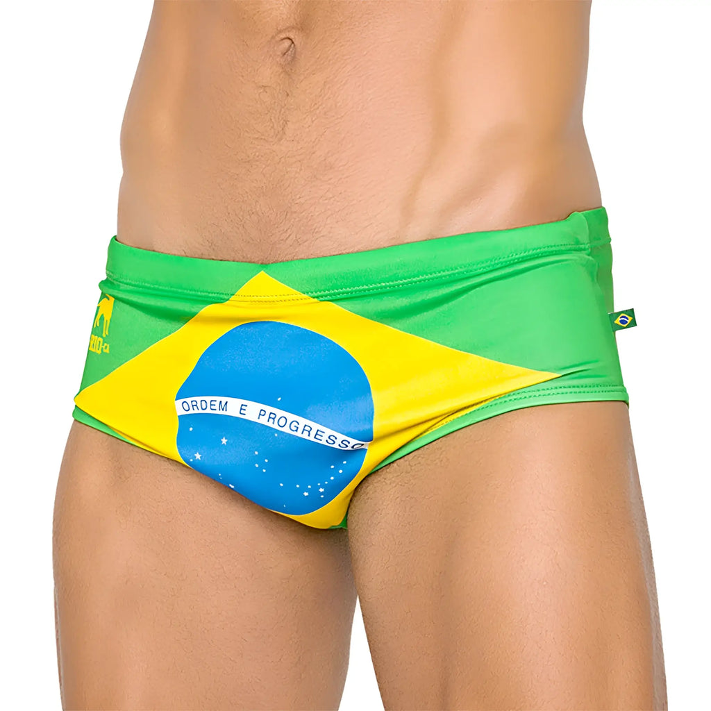 Team brasil flag sunga men’s designer swimwear featuring green and yellow brazilian flag-themed trunks with ordem e progresso detail