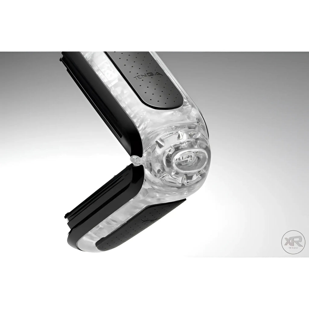 Tenga Flip 0-Zero Black angled open to show the internal transparent textured sleeve and black outer casing.