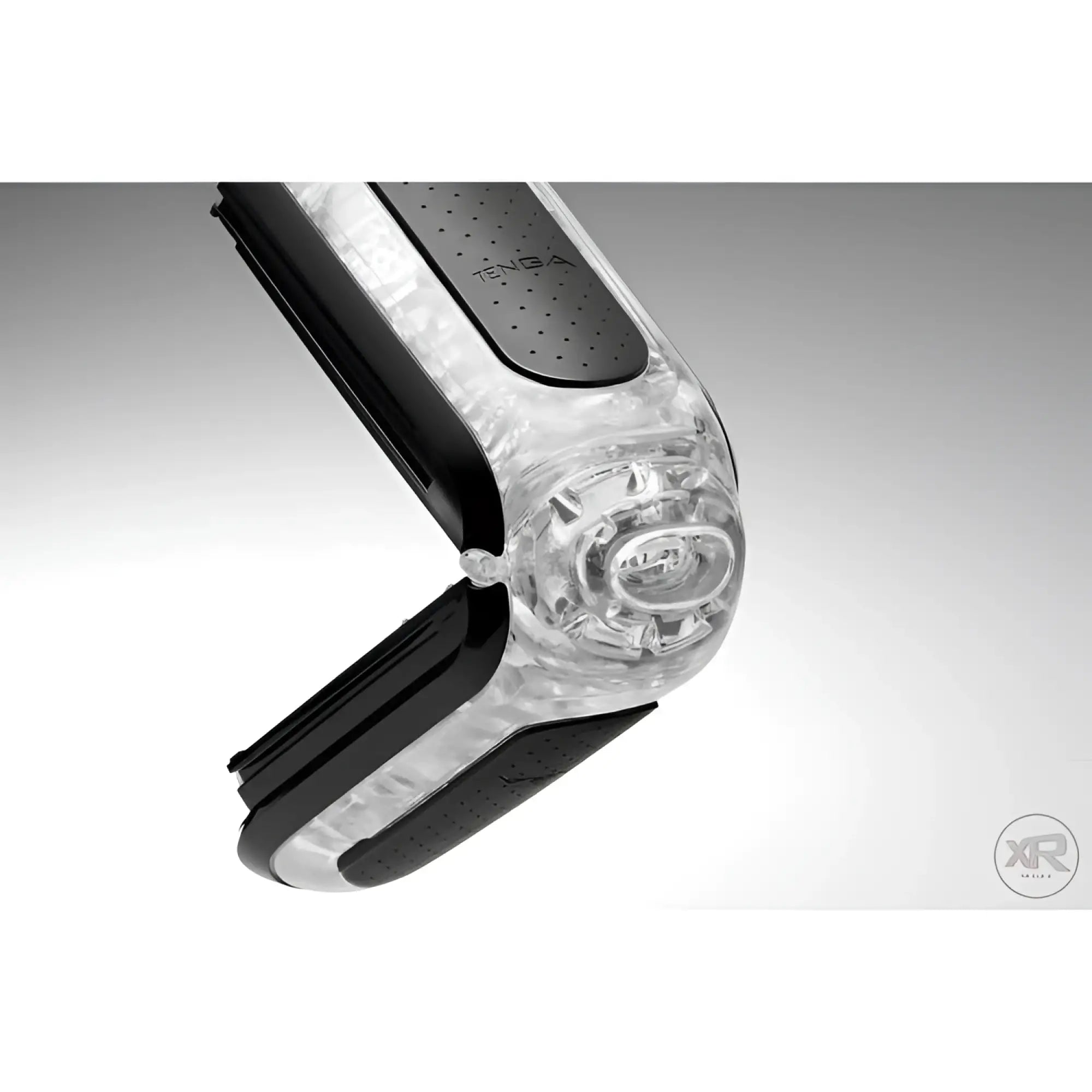 Tenga Flip 0-Zero Black angled open to show the internal transparent textured sleeve and black outer casing.