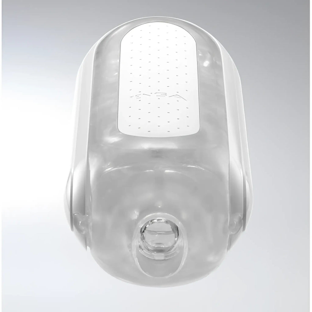 Tenga Flip 0 Zero male pleasure device in a sleek, transparent and white cylindrical design against a grey background.