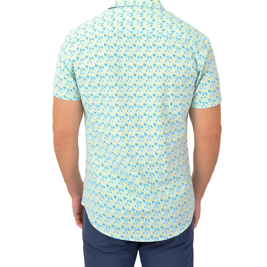 A light blue and pale yellow short-sleeved button-up shirt with a subtle repeating floral pattern for casual wear