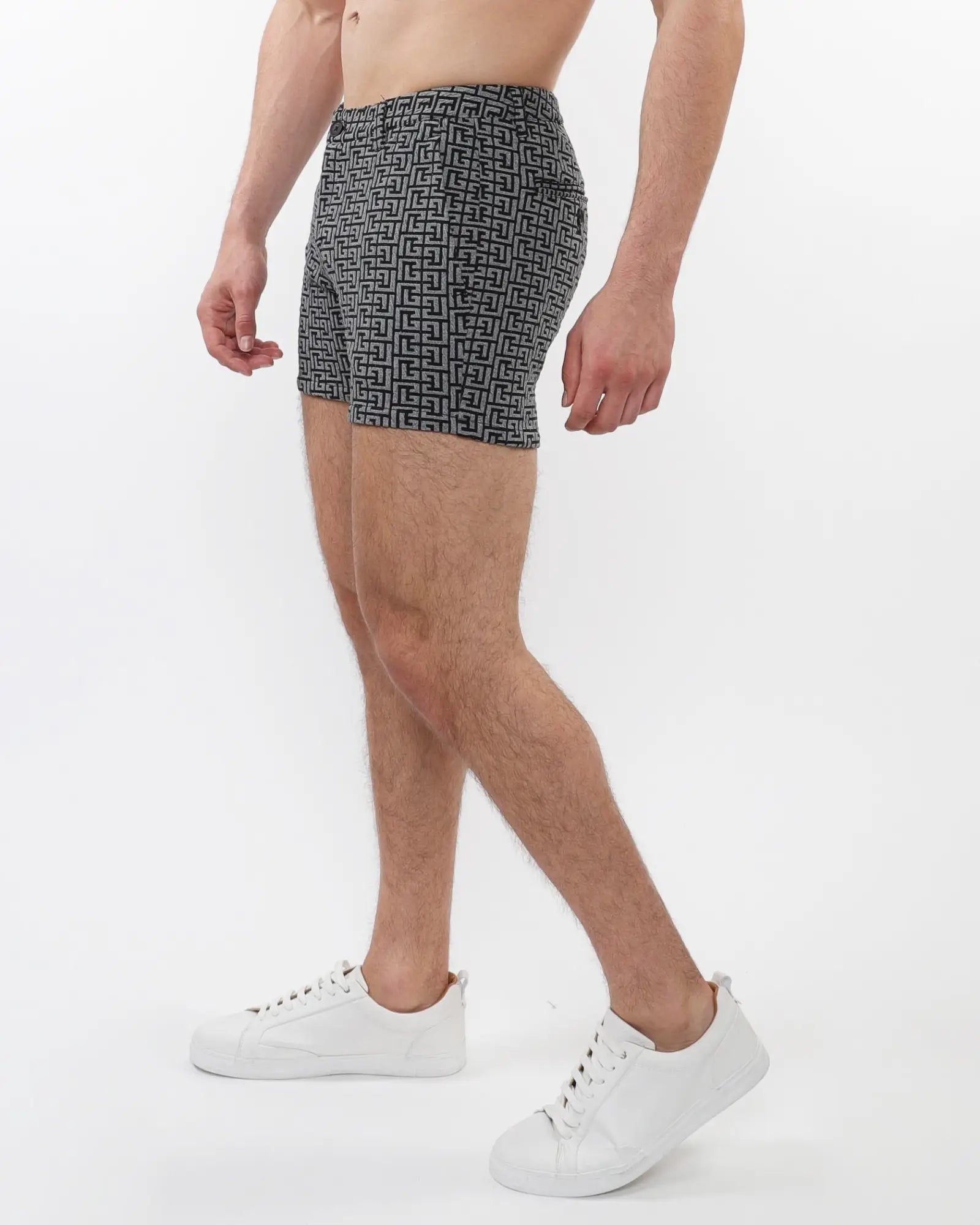 Black and gray geometric-patterned men’s boxer briefs with textured jacquard stretch knit fabric and snug fit