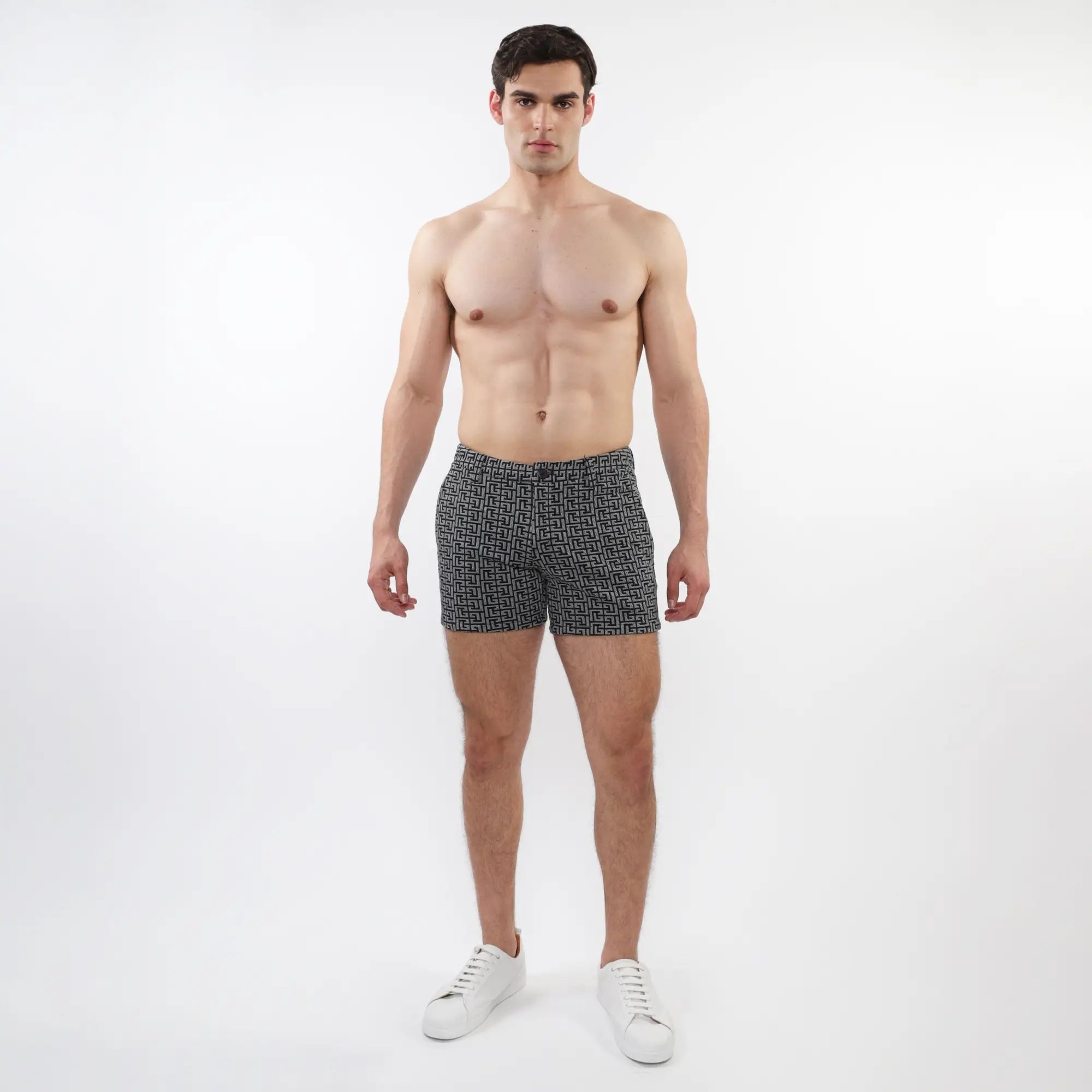 Black and white geometric patterned textured jacquard stretch knit chino shorts with zip pockets for men