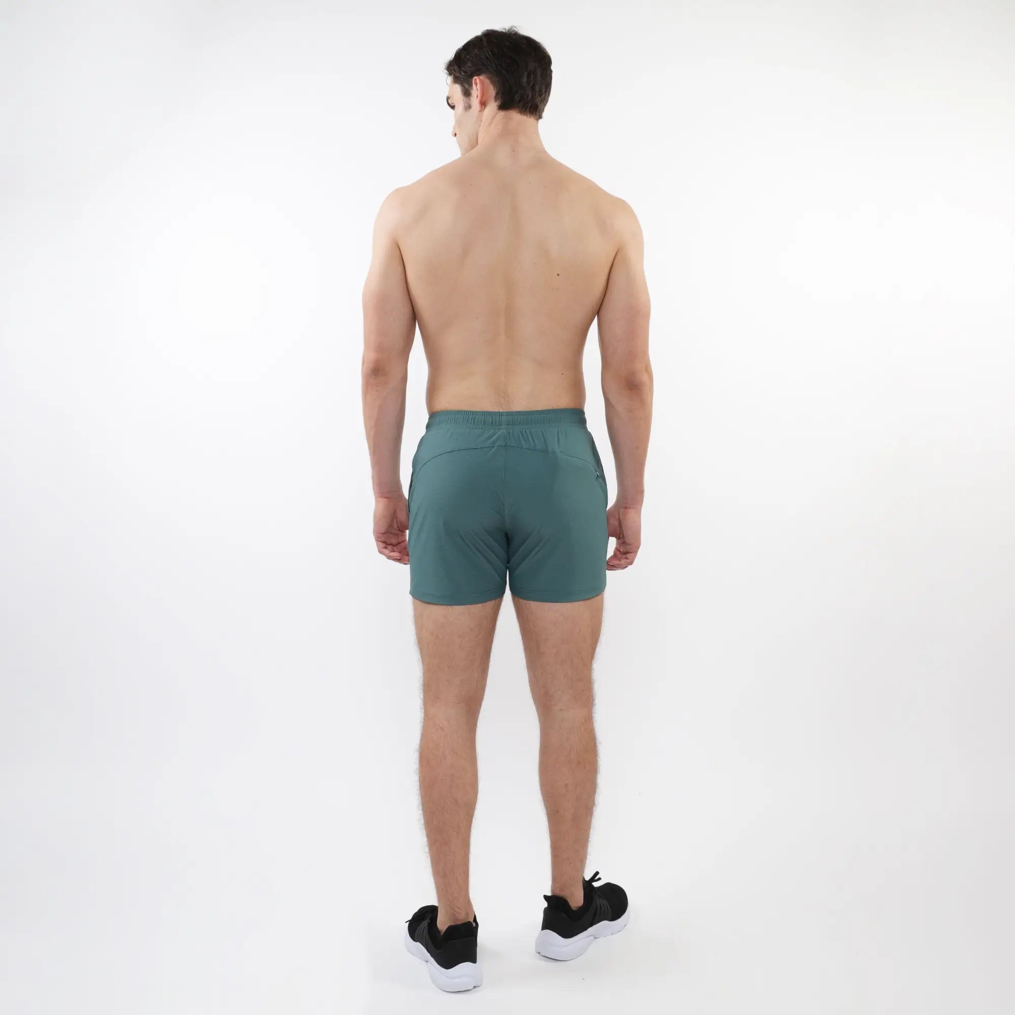 Teal textured mesh stretch performance shorts with sleek design and elastic waistband for athletic use