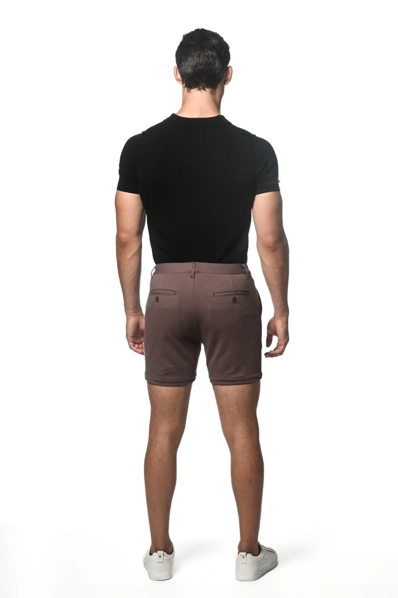 Brown textured stretch knit chino shorts shown from the back with two pockets and dark brown buttons