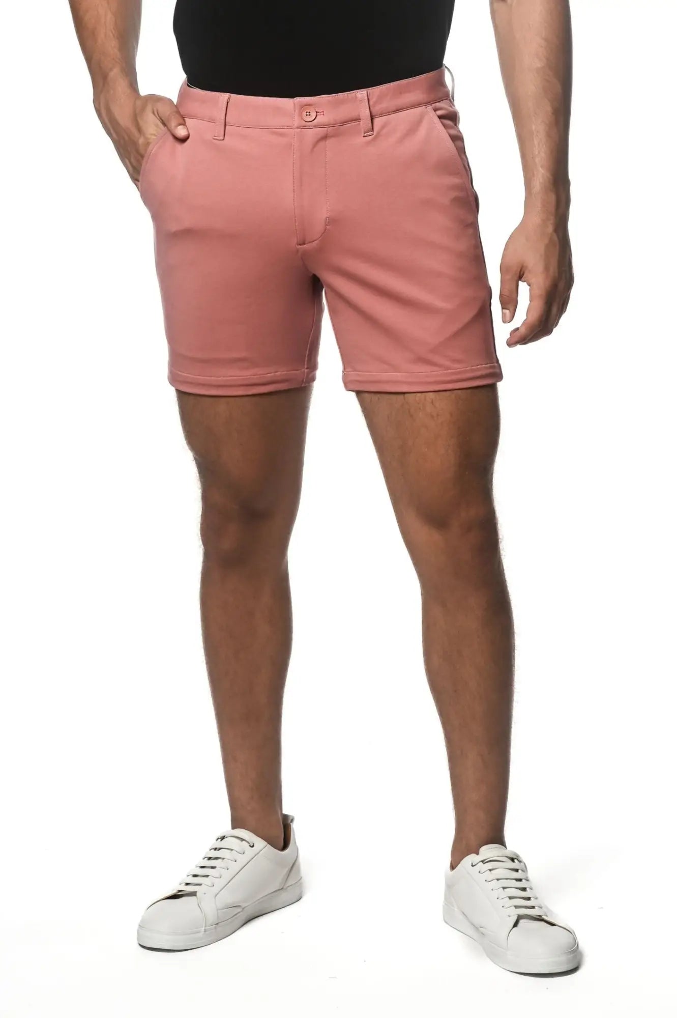 Textured stretch knit chino shorts in crisp pink with button closure and belt loops for comfortable casual wear