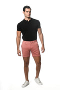Crisp pink textured stretch knit chino shorts with a classic five pocket design and button closure