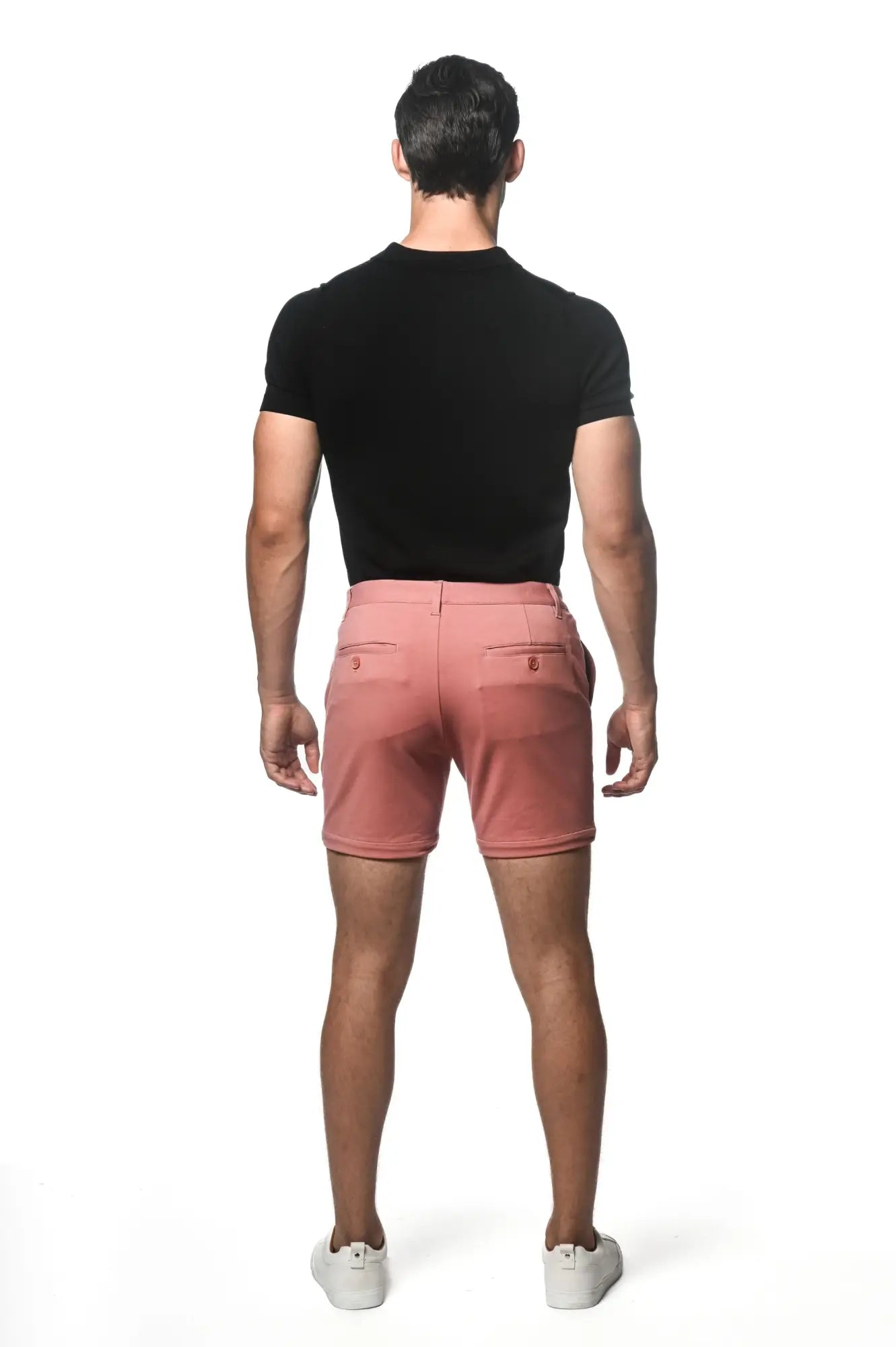 Crisp pink textured stretch knit chino shorts with tailored fit and subtle stitching details