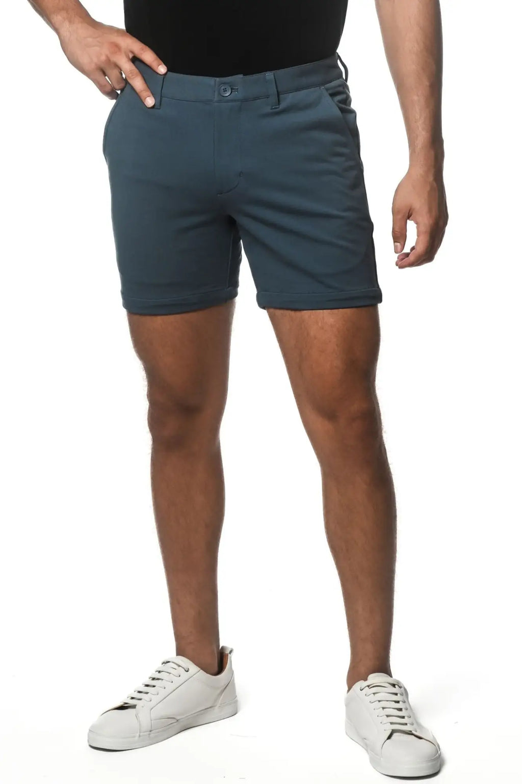 Dark teal textured stretch knit chino shorts with classic fit and button closure for casual wear