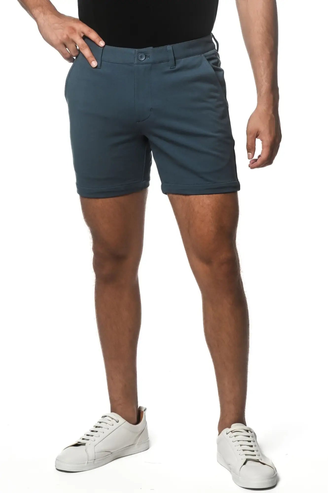 Dark teal textured stretch knit chino shorts with classic fit and button closure for casual wear
