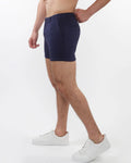 Navy blue textured stretch knit chino shorts with zip pockets featuring a sleek tailored fit and subtle side pockets