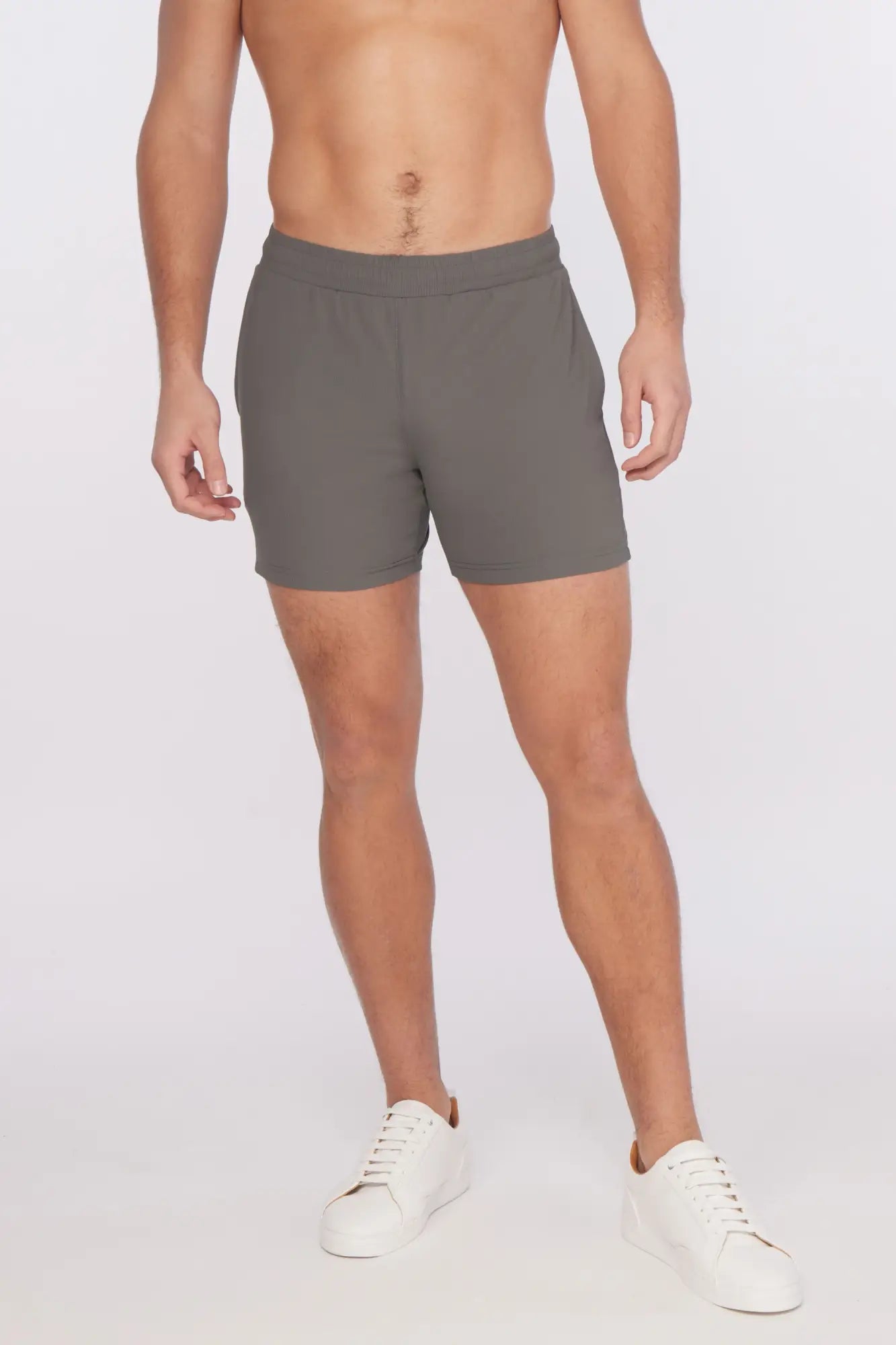 Gray textured stretch performance shorts with comfortable elastic waistband and subtle side pockets