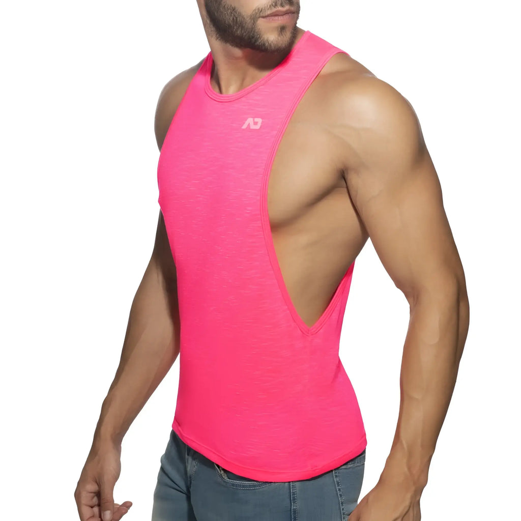 Bright pink thin flame low rider athletic tank top with distinctive cutout back and subtle chest logo