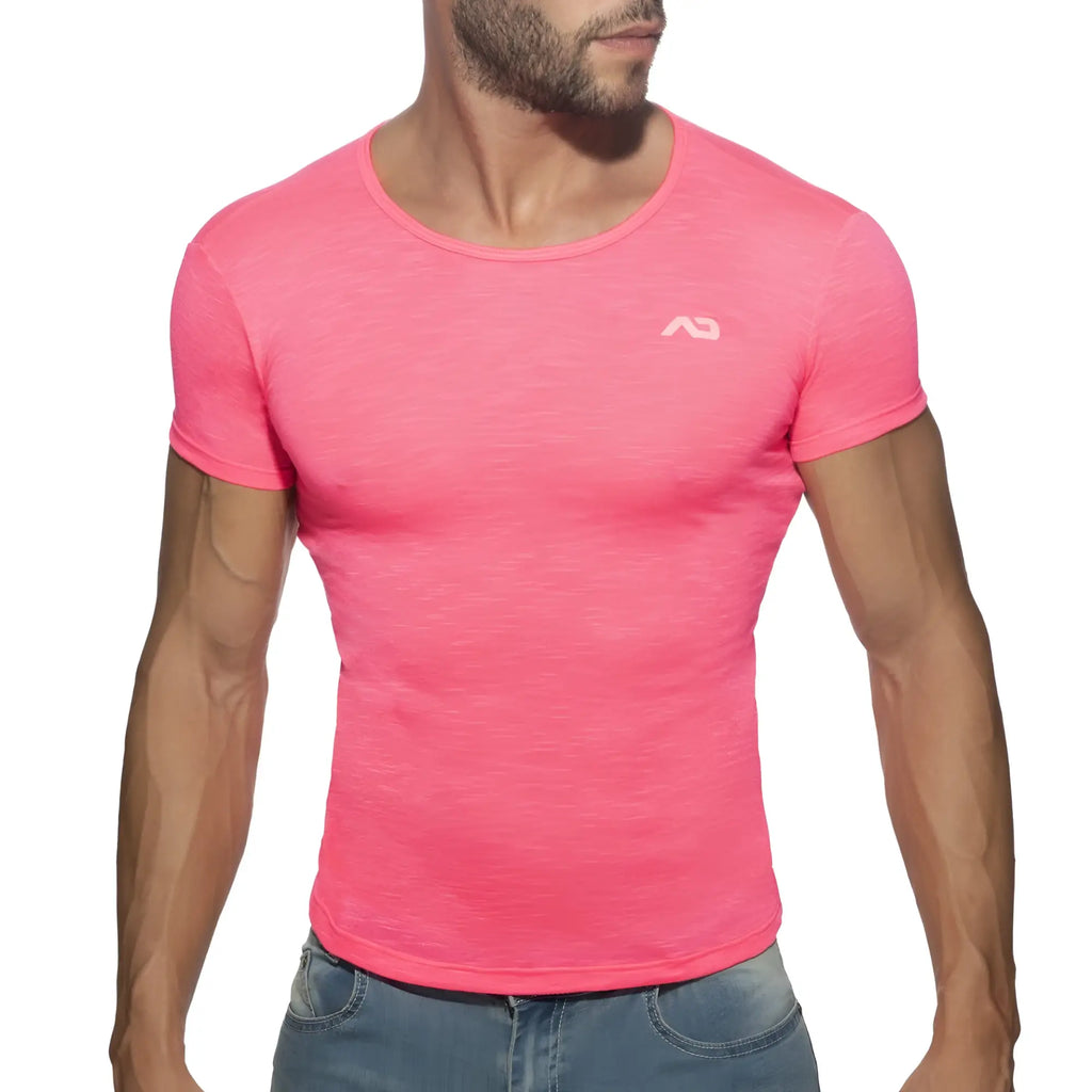 A vibrant pink short-sleeved thin flame t-shirt with subtle heathered texture and a small white chest logo