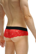 Red lace thong blécourt with black elastic waistband showcasing delicate lace material and vibrant red color