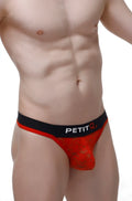 Red lace men’s thong briefs with black petit waistband featuring intricate lace design and vibrant red color