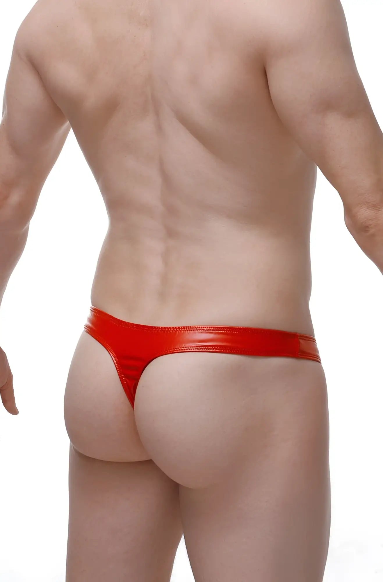 Red shiny vinyl thong featuring a zip detail made from latex showing the back side of the product