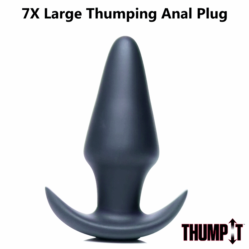 Thump It Kinetic 7X Large anal plug in matte black, featuring a tapered shaft and a wide, curved base.