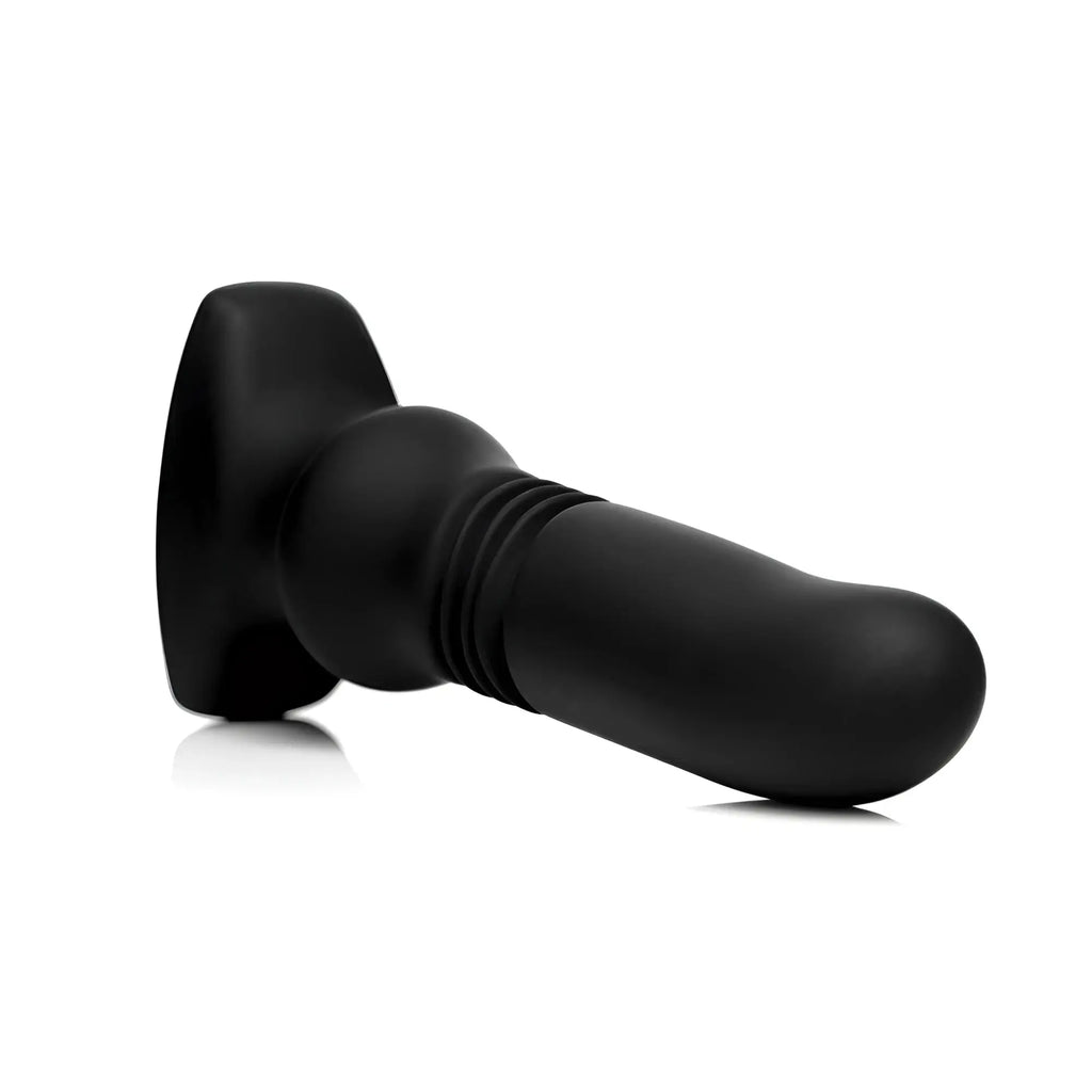 Black Thunderplugs silicone vibrating and thrusting plug with a wide base and ribbed, rounded shaft on white background.