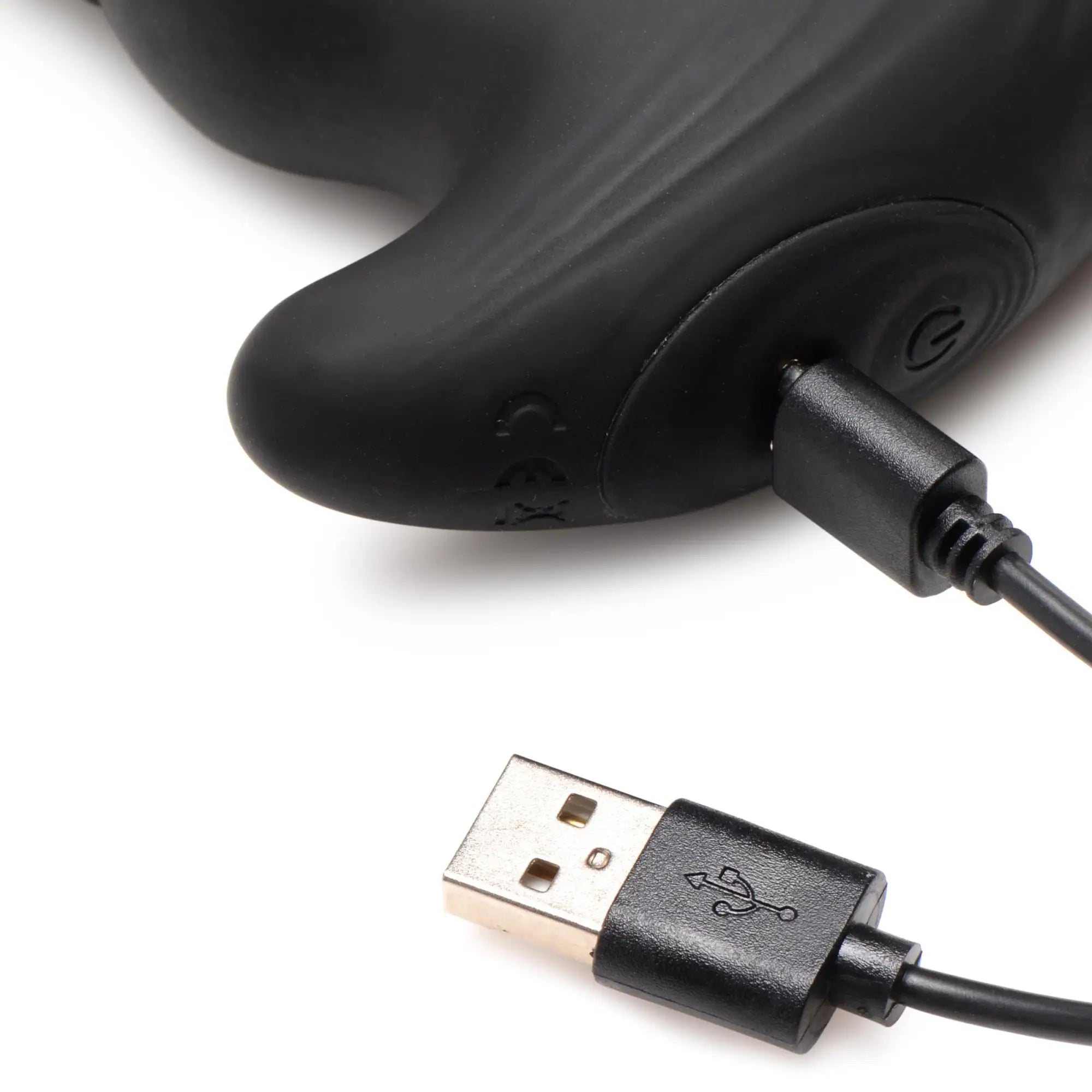 Black Thunderplugs thrusting vibrator with a power button and an attached USB charging cable on a white background.
