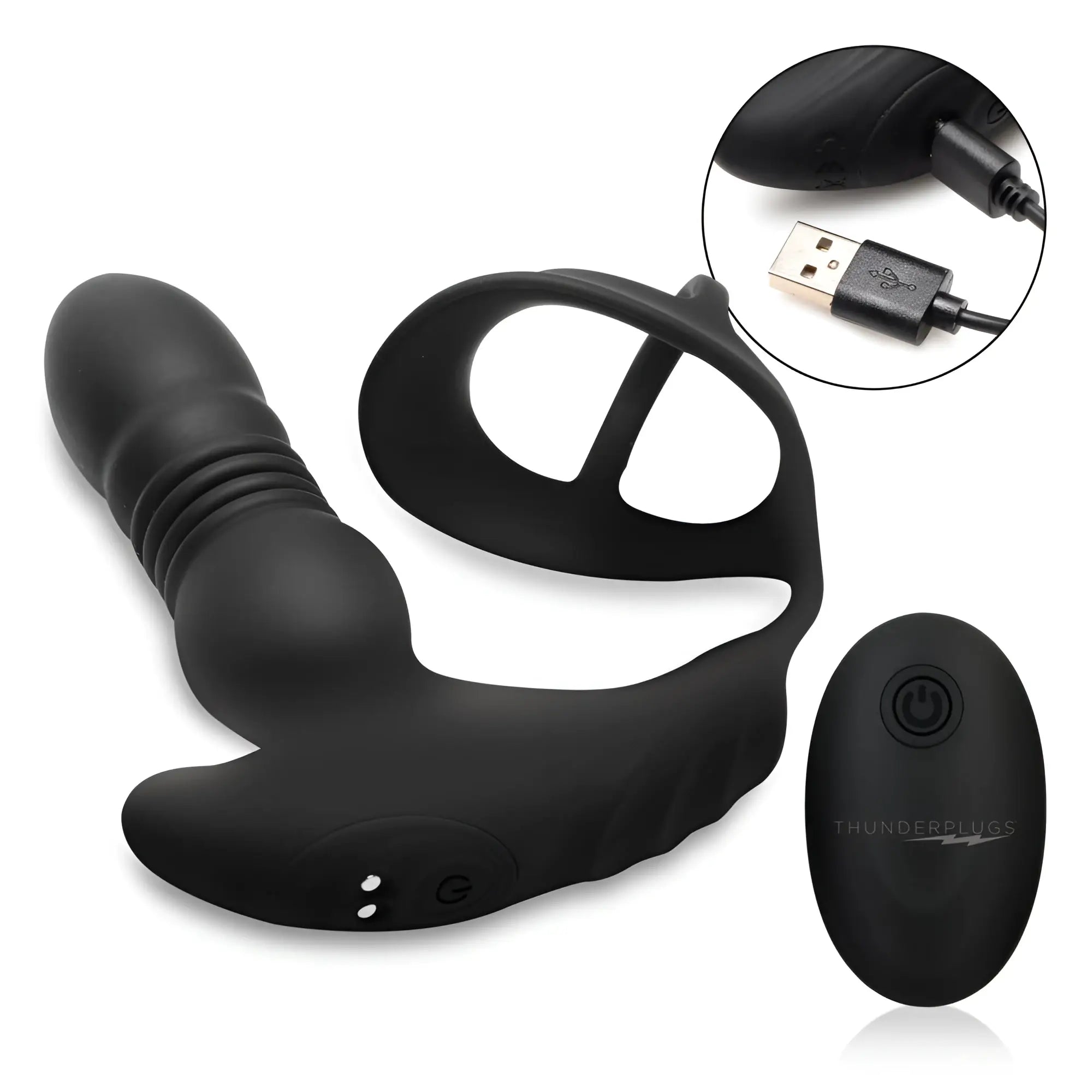 Black Thunderplugs thrusting vibrator with cock ring, remote control, and USB charging cable on a white background.