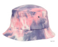 A soft tie dye bucket hat in pink and purple hues with subtle white streaks made of comfortable fabric
