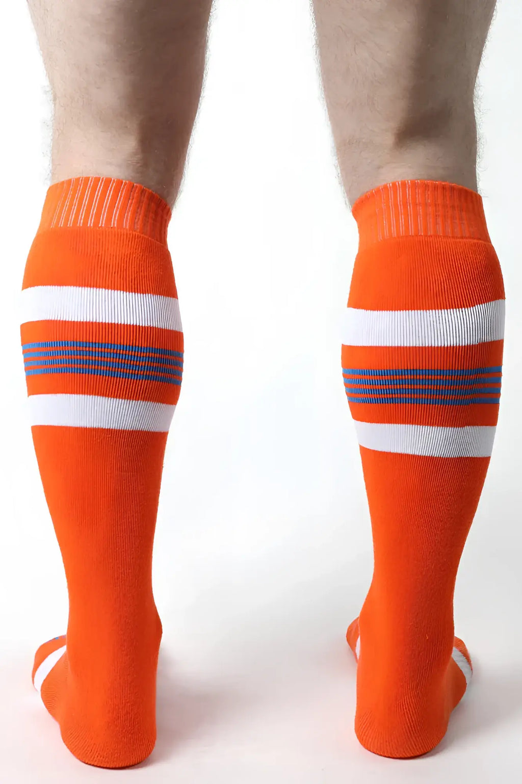 Tight end knee high socks in bright orange with white and navy blue horizontal stripes for athletic use
