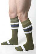 Olive green tight end knee high athletic socks with white and navy blue stripes and ribbed cuff and toe design
