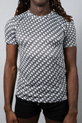 Black and white geometric patterned short sleeve rash guard tile print tee for sun protection and active wear
