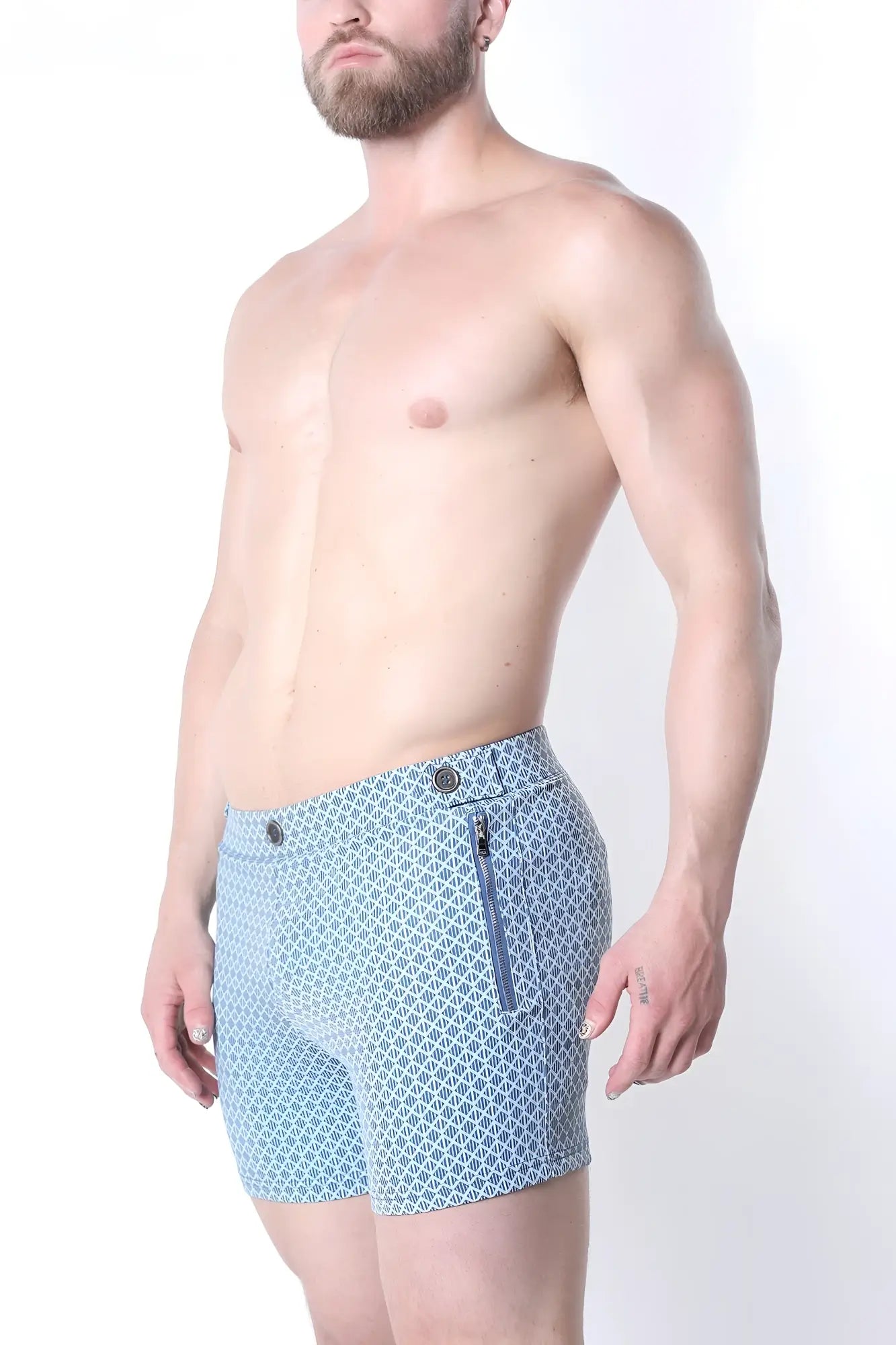 Light blue patterned clemente swim short with subtle geometric design and matching zipper detail limited edition
