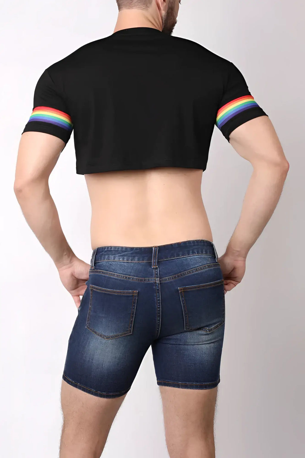 Black crop top with rainbow stripe sleeves from timoteo pride 23 collection made of soft comfortable fabric